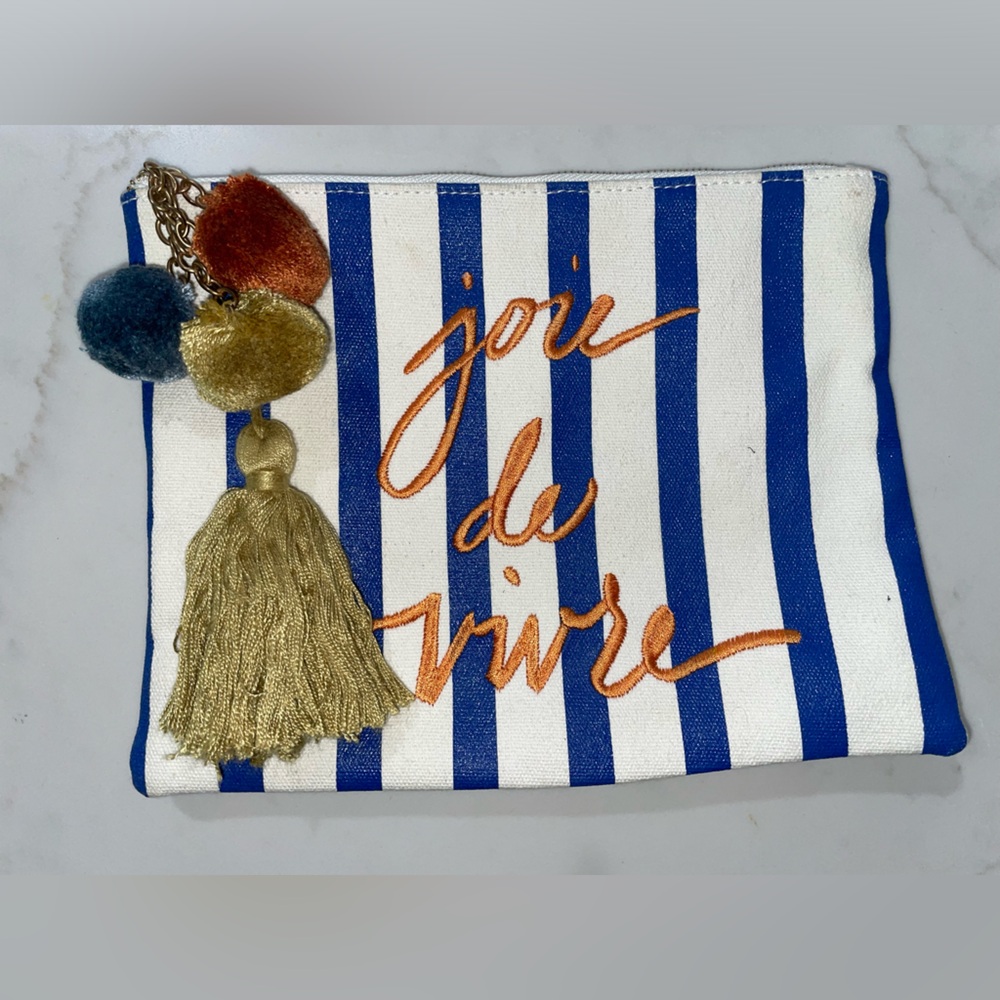 Ann Taylor cosmetic storage bag with tassel